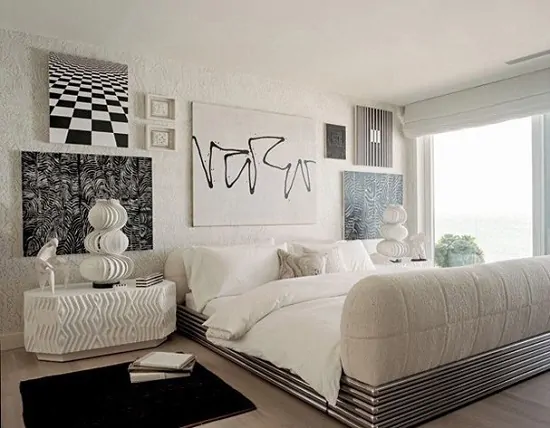 Suíte do casal com quadros preto e branco modernos e decoração branca